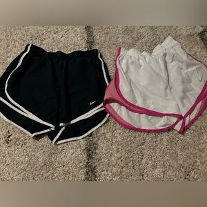 NIKE SHORTS. Pink/white are small. Navy/white are medium